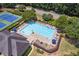 Aerial view of a large community pool with ample seating and lush landscaping at 878 Treadstone Overlook, Suwanee, GA 30024