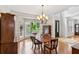 Elegant dining room featuring hardwood floors and bay window at 878 Treadstone Overlook, Suwanee, GA 30024