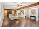 Inviting living room with hardwood floors, modern furniture, and decorative barn doors at 878 Treadstone Overlook, Suwanee, GA 30024