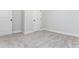 Bedroom with neutral carpet, gray walls, white baseboards and doors at 1100 Pleasant Grove Church Rd, Villa Rica, GA 30180