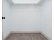 Walk-in closet with carpet, white walls, a shelf and rod at 1100 Pleasant Grove Church Rd, Villa Rica, GA 30180