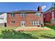 Brick exterior with a well-maintained backyard and patio, perfect for outdoor entertaining at 2765 Turning Leaf Dr, Lawrenceville, GA 30044