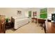 Cozy bedroom with neutral carpet, two windows, and a desk area at 3120 Henderson Walk, Atlanta, GA 30340
