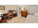 Bedroom with neutral carpet, a desk, and a dresser at 3120 Henderson Walk, Atlanta, GA 30340
