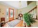 Foyer boasts hardwood floors, ornate glass front door and staircase at 3120 Henderson Walk, Atlanta, GA 30340
