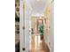 Hallway showcasing wood floors and a view of the front door at 3120 Henderson Walk, Atlanta, GA 30340