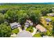 Overhead shot of a charming home nestled in a cul-de-sac, surrounded by mature trees and well-kept lawns at 4816 Morning Chase Nw, Acworth, GA 30102