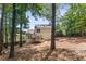 Spacious backyard showcasing a deck and seating area, offering a serene outdoor living space at 4816 Morning Chase Nw, Acworth, GA 30102