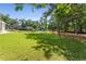 Lush green lawn with trees leading to a community pool, picnic tables, and playground at 4816 Morning Chase Nw, Acworth, GA 30102
