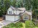 Charming two-story home with a stone accent, attached garage, and well-maintained landscaping at 4816 Morning Chase Nw, Acworth, GA 30102