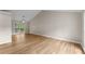 Spacious living room featuring hardwood floors, natural light, and neutral paint at 4816 Morning Chase Nw, Acworth, GA 30102