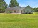 Expansive backyard featuring a well-maintained lawn, ideal for outdoor activities at 1102 Ola Dale Ct, Mcdonough, GA 30252