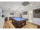 Finished basement with a pool table, recessed lighting, and durable laminate flooring at 1151 Roxboro Ne Cv, Atlanta, GA 30324