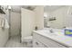 Neat bathroom with a large vanity, ceramic tile floor, and shower-tub combination at 1151 Roxboro Ne Cv, Atlanta, GA 30324