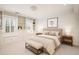 Serene bedroom featuring built-in shelving, window seat and neutral decor at 1151 Roxboro Ne Cv, Atlanta, GA 30324