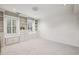 Spacious bonus room featuring built-in bookshelves, cabinets and window seat storage at 1151 Roxboro Ne Cv, Atlanta, GA 30324