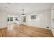 Open concept living space with hardwood floors, recessed lighting, and an open view of the kitchen at 1151 Roxboro Ne Cv, Atlanta, GA 30324