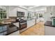 Modern kitchen with granite countertops, stainless steel appliances, and hardwood floors at 1151 Roxboro Ne Cv, Atlanta, GA 30324
