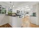 Gourmet kitchen with white cabinetry, granite countertops, stainless steel appliances, and a functional layout at 1151 Roxboro Ne Cv, Atlanta, GA 30324