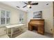 Bright office space with built-in desk, drawers, and natural light from shuttered windows at 1151 Roxboro Ne Cv, Atlanta, GA 30324