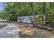 Vibrant mural with benches in Shady Valley Park, Atlanta at 1151 Roxboro Ne Cv, Atlanta, GA 30324
