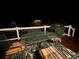Charming deck with comfortable seating, grill and a view of the gazebo in the backyard at 1461 Radstone Dr, Lawrenceville, GA 30044