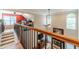 View of the foyer that showcases hardwood floors, and a view of the living room at 1461 Radstone Dr, Lawrenceville, GA 30044