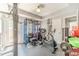 Well-equipped home gym with weight machines, a stationary bike, and ample space for workouts at 1461 Radstone Dr, Lawrenceville, GA 30044