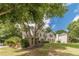 A beautiful two-story home with mature trees and a well-maintained lawn at 1461 Radstone Dr, Lawrenceville, GA 30044