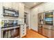Kitchen with stainless steel appliances and white cabinetry at 1461 Radstone Dr, Lawrenceville, GA 30044