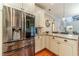 Kitchen featuring stainless steel refrigerator and granite countertops at 1461 Radstone Dr, Lawrenceville, GA 30044