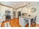 Modern kitchen with stainless steel appliances, granite counters, and a breakfast bar at 1461 Radstone Dr, Lawrenceville, GA 30044