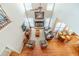 Open-concept living room with hardwood floors, fireplace, ample natural light, and comfortable seating at 1461 Radstone Dr, Lawrenceville, GA 30044