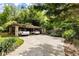 A carport provides covered parking for two cars and features a stone facade at 2837 N Hills Ne Dr, Atlanta, GA 30305