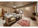 A spacious home theater offers tiered seating, a large screen, and stylish decor at 2837 N Hills Ne Dr, Atlanta, GA 30305