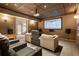 A cozy home theater boasts comfortable seating, a large screen, and modern lighting at 2837 N Hills Ne Dr, Atlanta, GA 30305