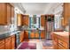 Well-equipped kitchen with stainless steel appliances, wood cabinets, and unique design elements at 2837 N Hills Ne Dr, Atlanta, GA 30305