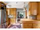 Functional kitchen featuring stainless steel appliances, butcher block countertops, and ample cabinet space at 2837 N Hills Ne Dr, Atlanta, GA 30305