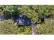 Aerial shot of the home's roof surrounded by green foliage at 4214 Williamsburg Dr, College Park, GA 30337
