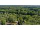 A gorgeous view from above shows the mature trees surrounding this homes at 4214 Williamsburg Dr, College Park, GA 30337