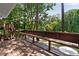 Back deck showing bench seating and stairs to backyard at 4214 Williamsburg Dr, College Park, GA 30337