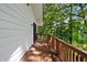 Wooden deck overlooking the wooded backyard provides serenity at 4214 Williamsburg Dr, College Park, GA 30337