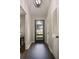 Light and bright entry way with a dark wood floor, and neutral walls at 4214 Williamsburg Dr, College Park, GA 30337