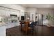 Bright kitchen featuring white cabinets, granite countertops, stainless steel appliances, and a stylish island at 4214 Williamsburg Dr, College Park, GA 30337