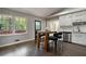 Eat-in kitchen area with dark hardwood flooring and views of the outdoors at 4214 Williamsburg Dr, College Park, GA 30337