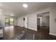 Spacious living room with hardwood floors and sliding glass doors leading to a deck at 4214 Williamsburg Dr, College Park, GA 30337
