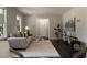 Cozy living room with a comfortable sofa, stylish decor, and ample natural light creating a welcoming ambiance at 4214 Williamsburg Dr, College Park, GA 30337
