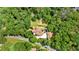 Aerial view of home with circular driveway and lush green trees at 52 Waterside Se Dr, Cartersville, GA 30121