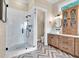 Modern bathroom featuring glass enclosed shower and custom wood cabinetry at 52 Waterside Se Dr, Cartersville, GA 30121