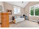 Comfortable bedroom with closet, large window, and neutral walls at 52 Waterside Se Dr, Cartersville, GA 30121